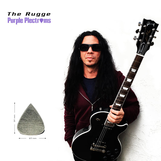 guitarist with long dark hair holding his guitar