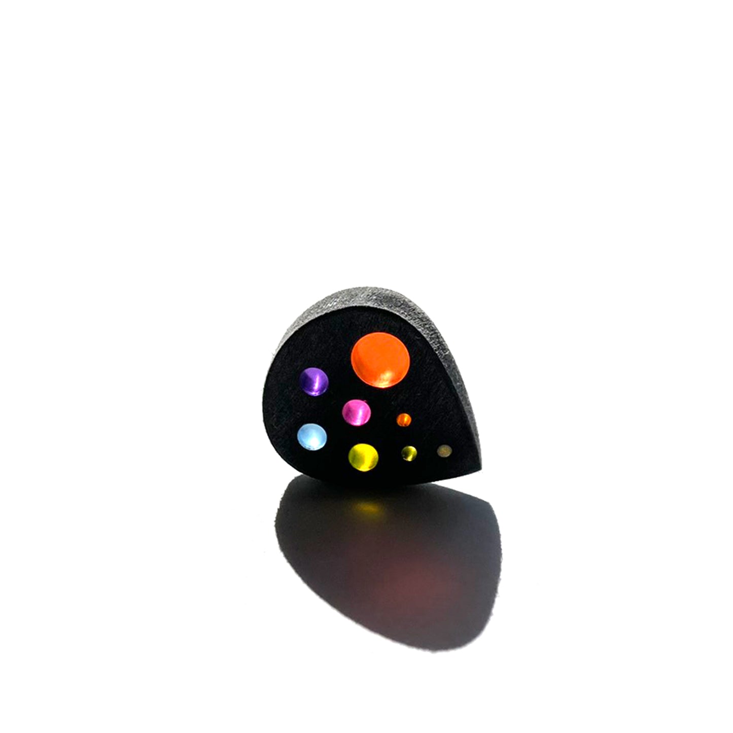 small guitar pick with a solar system color optics design