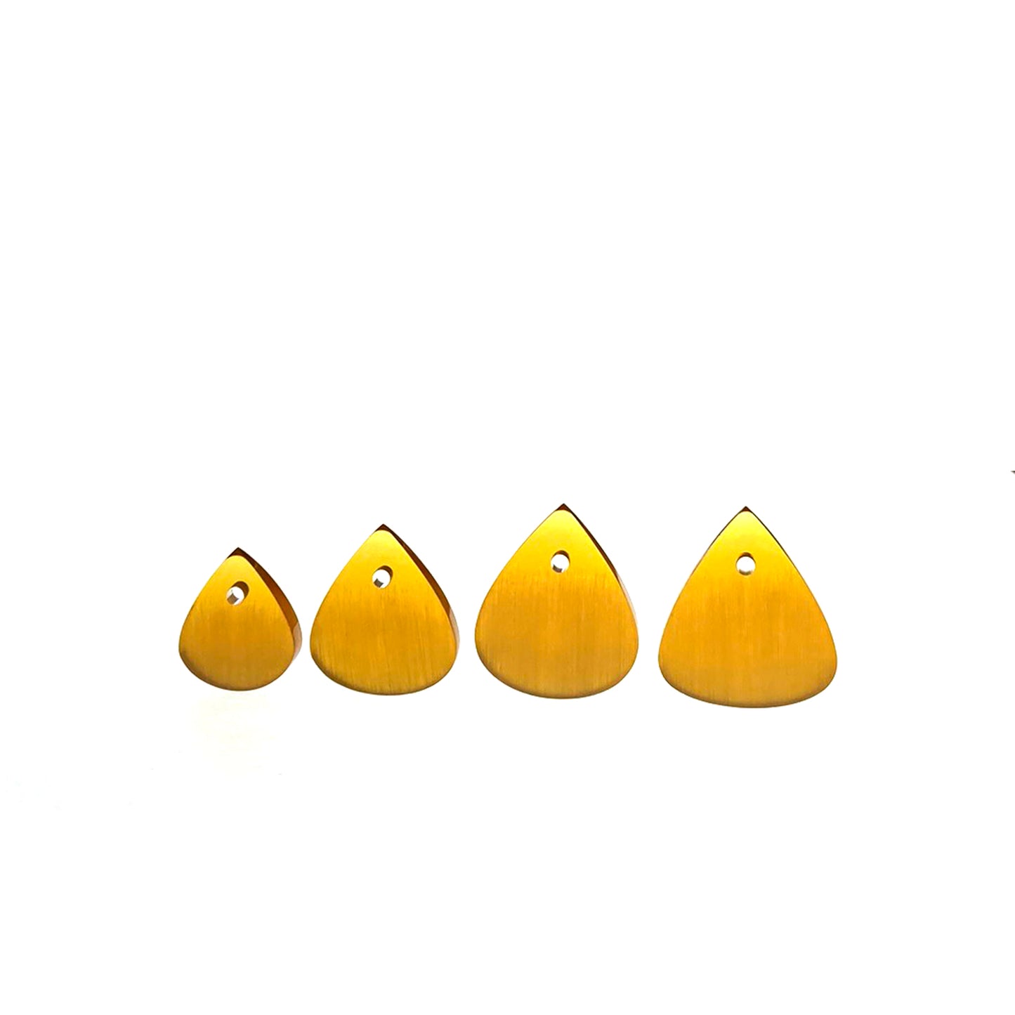 group of amber colored ultem guitar picks