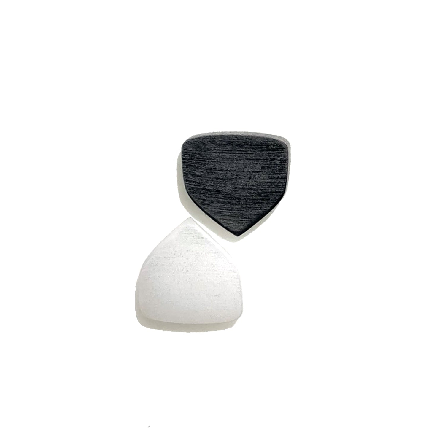 pair of black and white Amar guitar picks