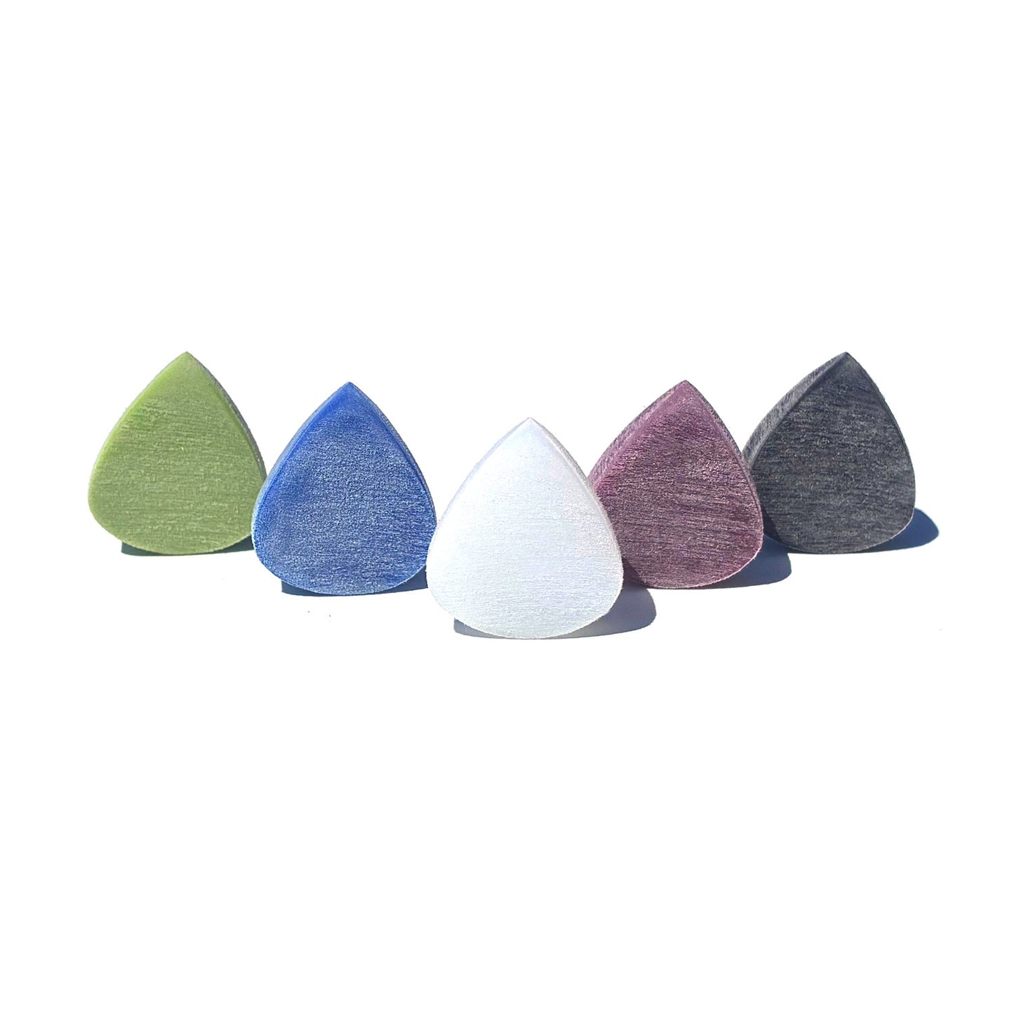 Apollo MidTech guitar picks in various colors showcasing their unique shapes and designs.