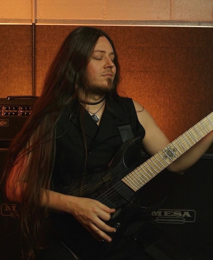 Doug Weiand playing the guitar