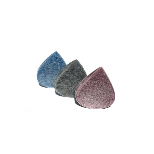 trio of picks against a white background